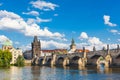 Prague, Czech Republic, Charles Bridge across Vltava river on which the ship sails Royalty Free Stock Photo