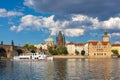 Prague, Czech Republic, Charles Bridge across Vltava river on which the ship sails Royalty Free Stock Photo