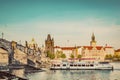 Prague, Czech Republic. Charles Bridge, boat cruise on Vltava river. Vintage Royalty Free Stock Photo