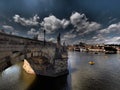 Prague, Czech Republic. Charles Bridge and Hradcany Prague Castle with St. Vitus Cathedral and St. George church evening dusk