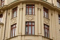 Prague, Czech Republic. 10.05.2019: Close-up view of the facade with windows of old historical buildings in Prague. Retro, old- Royalty Free Stock Photo