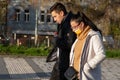 11/16/2020. Prague, Czech Republic. A couple is walking close to Hradcanska tram stop during quarantine she is wearing a mask