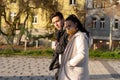 11/16/2020. Prague, Czech Republic. A couple is walking close to Hradcanska tram stop during quarantine she is wearing a mask