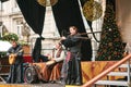 Prague, Czech Republic, December 13, 2016: Christmas performance on stage in Prague`s main square. The ethnic collective