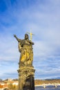 Prague, Czech Republic - December 31, 2017: The gothic sculpture of the John the Baptist on the Charles bridge Royalty Free Stock Photo