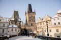 Prague, Czech Republic, 15 December 2022: Lesser Town with Mala Strana bridge towers with spire above River Vltava, View from Royalty Free Stock Photo