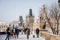 Prague, Czech Republic, 15 December 2022: Lesser Town with Mala Strana bridge towers with spire above River Vltava, View from Royalty Free Stock Photo