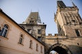 Prague, Czech Republic, 15 December 2022: Lesser Town with Mala Strana bridge towers with spire above River Vltava, View from Royalty Free Stock Photo