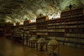 Prague, Czech Republic: old library with globes and a lot of books inside decorated shelves Theological hall, Royalty Free Stock Photo