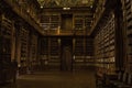 Prague: old library with a lot of books inside decorated shelves and a frescoed ceiling Philosophical hall, Strahov Library