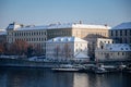 Prague, Czech Republic, 15 December 2022: Old town with towers above River Vltava, View from Charles bridge, snow on roof at sunny Royalty Free Stock Photo