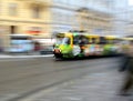 PRAGUE, CZECH REPUBLIC - December 31,2014: Old tram in modern advertising moving in motion blur Royalty Free Stock Photo