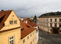 Rooftops of Mala Strana neighborhood with view of Charles Bridge in Prague Royalty Free Stock Photo