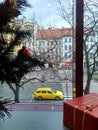 Prague, Czech Republic - December 24, 2017, yellow taxi from the window Royalty Free Stock Photo