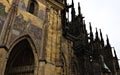 Prague, Czech Republic: Exterior details of St. Vitus Cathedral, a gothic religious building with towers, spires and mosaics