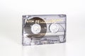 PRAGUE, CZECH REPUBLIC - FEBRUARY 20, 2019: Audio compact cassette TDK FE 90 Ferric view from left. Audio cassette on a white Royalty Free Stock Photo