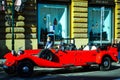 Prague, Czech Republic-February 25,2019: Retro red car parked in the city center Royalty Free Stock Photo