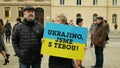 PRAGUE, CZECH REPUBLIC, FEBRUARY 24, 2022: Russian military attack demonstration people crowd against war Russia Ukraine