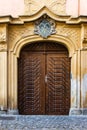 Medieval old carved wooden doors with heraldics in Prague Royalty Free Stock Photo