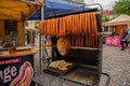 Prague, Czech Republic: Grill czech sausages on on street food outdoor market. Fried baked sausages. European street food. Street Royalty Free Stock Photo
