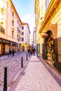 PRAGUE, CZECH REPUBLIC - 1.12.2018: Historical aisle in Prague town center. Shops and restaurant in centre of czech capital Royalty Free Stock Photo