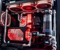 Prague, Czech Republic - 21 July 2021: Close-up of high performance Desktop PC and water cooling system with multicolored LED RGB