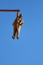Prague, Czech Republic - July 23, 2019: Man Hanging Out sculpture by the famous czech sculptor David Cerny in the old town of