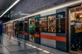 Prague, Czech Republic,23 July 2019; People at metro station entering subway train, long exposure technique for movement. Urban Royalty Free Stock Photo