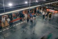 Prague, Czech Republic,23 July 2019; People at metro station entering subway train or walking by, long exposure technique for Royalty Free Stock Photo