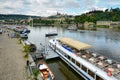 PRAGUE, CZECH REPUBLIC - JULY 20, 2017: Pleasure boat close-up with advertising inscription Boats of PragueView the Cathedral.