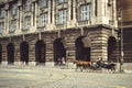 Historical architecture tourists ride horses in carriages. Prague, Czech Republic Royalty Free Stock Photo