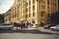 Historical architecture tourists ride horses in carriages. Prague, Czech Republic Royalty Free Stock Photo