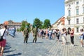 Prague, Czech Republic - June 27th 2019: Tourists watching traditional changing of honor guards in front of the Prague Castle.