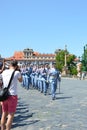 Prague, Czech Republic - June 27th 2019: Tourists watching traditional changing of honor guards in front of the Prague Castle.