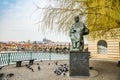 Prague, Czech republic - March 19, 2020. Novotneho lavka area with Bedrich Smetana statue by the Vltava river without tourists dur