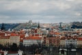 Prague, Czech Republic, 26 March 2023: Panorama of old town from Petrin Hill, Red roofs, Cloudy spring day, Vltava river