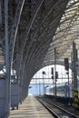 Platforms, trains and arches of a historic main train station which was built in 1871