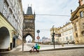 Prague, Czech republic - March 19, 2020. Square Krizovnicke namesti in front of entrance to Charles Bridge without tourists during