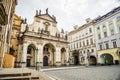 Prague, Czech republic - March 19, 2020. Square Krizovnicke namesti in front of entrance to Charles Bridge without tourists during