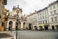 Prague, Czech republic - March 19, 2020. Square Krizovnicke namesti in front of entrance to Charles Bridge without tourists during