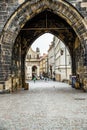 Prague, Czech republic - March 19, 2020. Square Krizovnicke namesti in front of entrance to Charles Bridge without tourists during