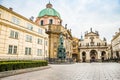 Prague, Czech republic - March 19, 2020. Square Krizovnicke namesti in front of entrance to Charles Bridge without tourists during