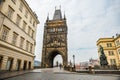 Prague, Czech republic - March 19, 2020. Square Krizovnicke namesti in front of entrance to Charles Bridge without tourists during