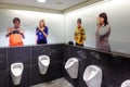 Prague, Czech Republic, March 23, 2012. Urinals in a public men`s toilet in a shopping mall in Prague