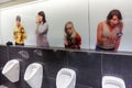 Prague, Czech Republic, March 23, 2012. Urinals in a public men`s toilet in a shopping mall in Prague