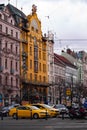 Prague, Czech Republic - March 12, 2018: Wenceslas Square - central boulevard with stylish hotel facades and yellow cabs, Prague Royalty Free Stock Photo