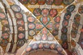 Prague, Czech Republic - May 2019: Decorated ceiling  of a room in old royal palace of Prague castle Royalty Free Stock Photo