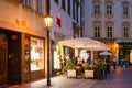 PRAGUE, CZECH REPUBLIC - MAY 2017: Tourists outside cafe, restaurant in the old town of Prague.