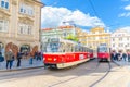 Prague, Czech Republic, May 13, 2019: Typical old retro vintage tram on tracks near tram stop in the streets Royalty Free Stock Photo