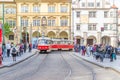 Typical old retro vintage tram on tracks near tram stop in Prague Royalty Free Stock Photo